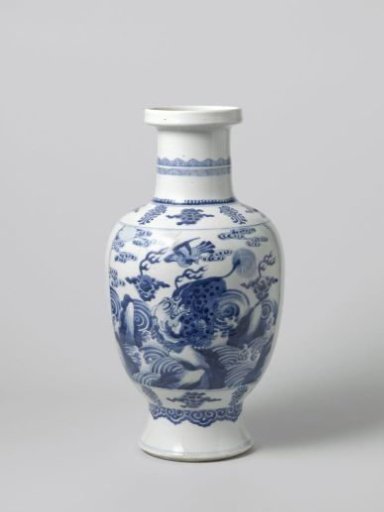 Ovoid vase with a shishi on a rock between waves