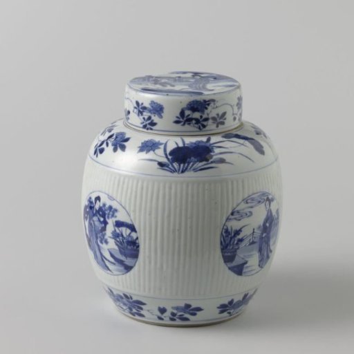Ovoid covered jar with fluted sides and figures in medallions