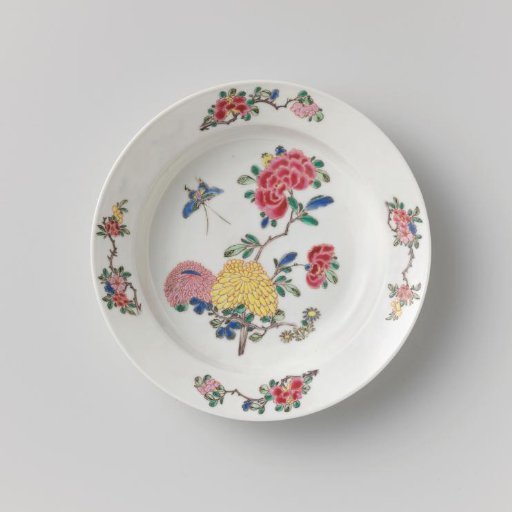 Plate with flower sprays and a butterfly