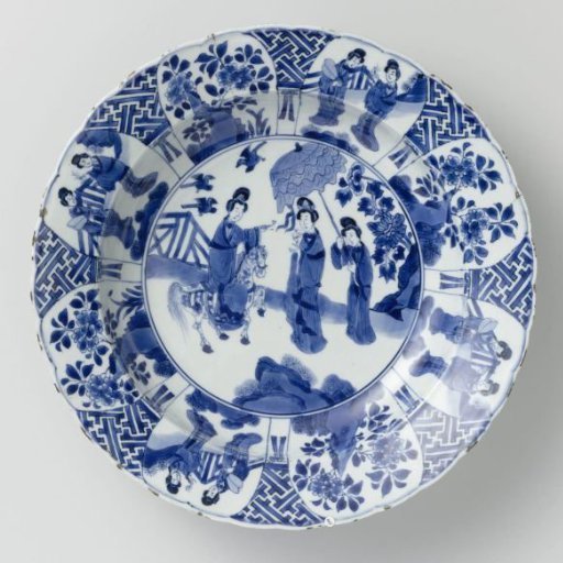 Dish with women in a fenced garden and flowering plants near a rock