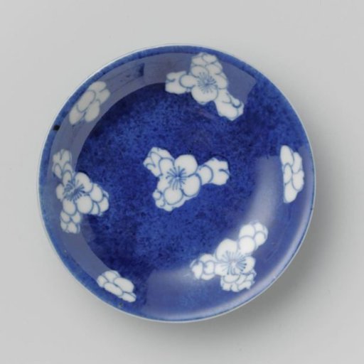 Saucer-dish with powder blue and flower heads in reserve