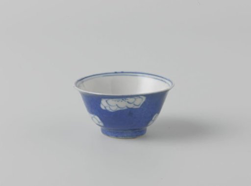 Bell-shaped cup with powder blue and flower heads in reserve