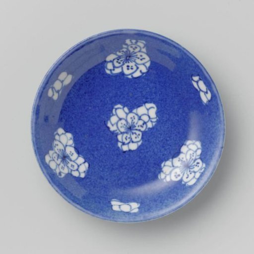 Saucer-dish with powder blue and flower heads in reserve