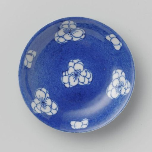 Saucer-dish with powder blue and flower heads in reserve