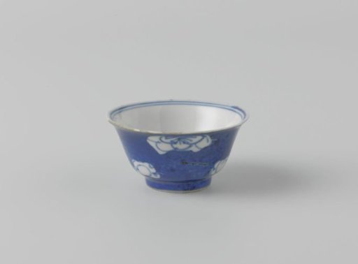 Bell-shaped cup with powder blue and flower heads in reserve
