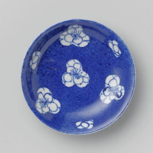 Saucer-dish with powder blue and flower heads in reserve