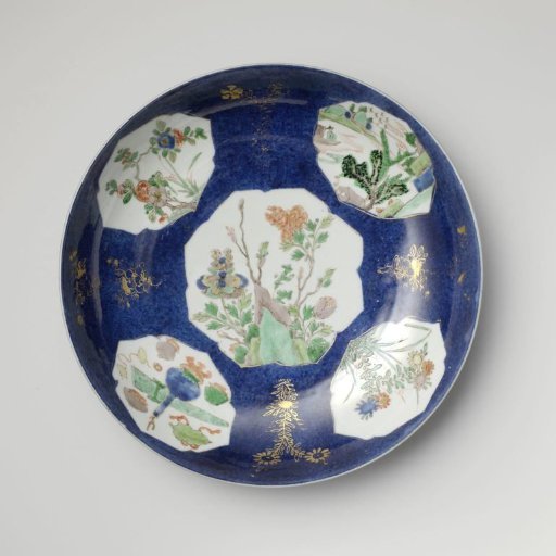 Saucer-dish with powder blue and panels in reserve with flower sprays, landscapes and precious objects