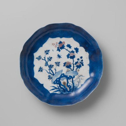 Saucer-dish with powder blue, rocks and flowering plants