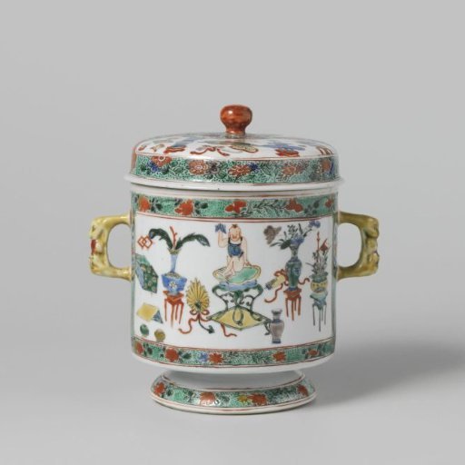 Covered jar with antiquities in panel decoration