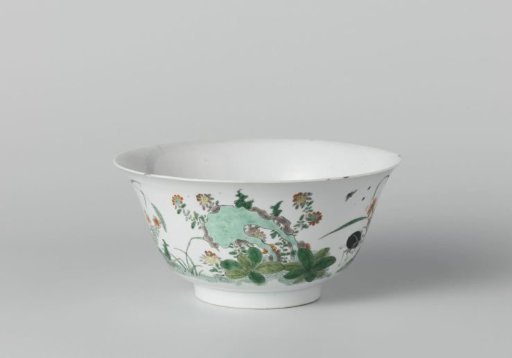 Bowl with insects and three rocks with flower sprays