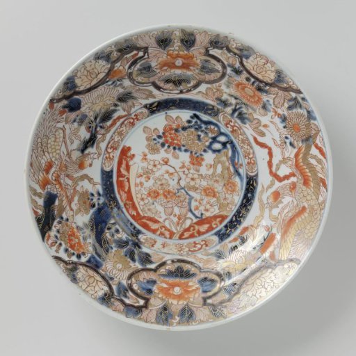 Dish with flowering plants, hoo-birds and flower sprays