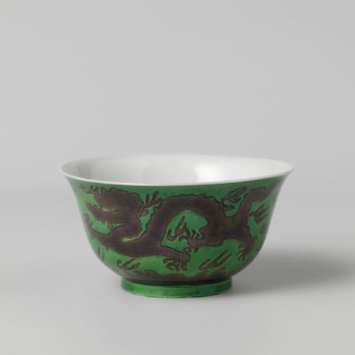 Bowl with pearl chasing dragons against a green ground