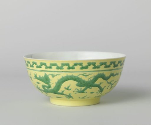 Bowl with two green pearl chasing dragons on a yellow ground