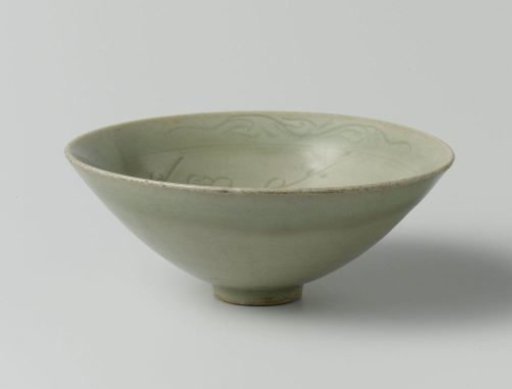 Conical bowl with incised prunus and cloud motif