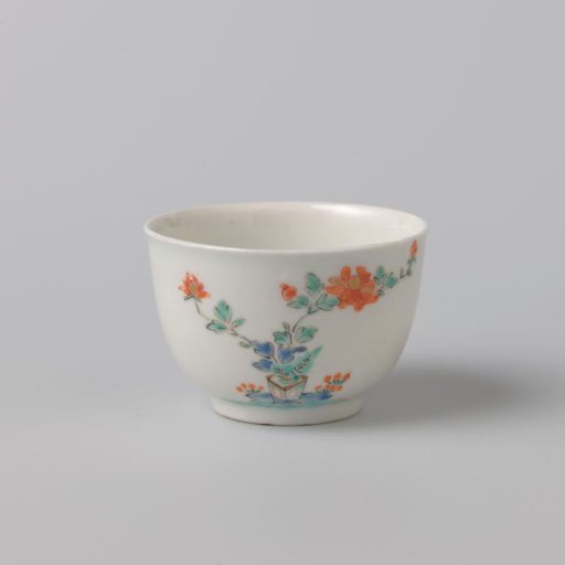 Cup with flower branches