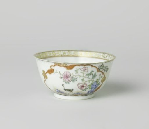 Bell-shaped cup with a crane near a peony plant and rock