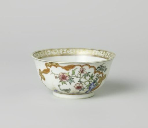 Bell-shaped cup with a crane near a peony plant and rock