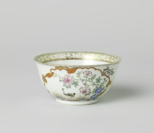 Bell-shaped cup with a crane near a peony plant and rock