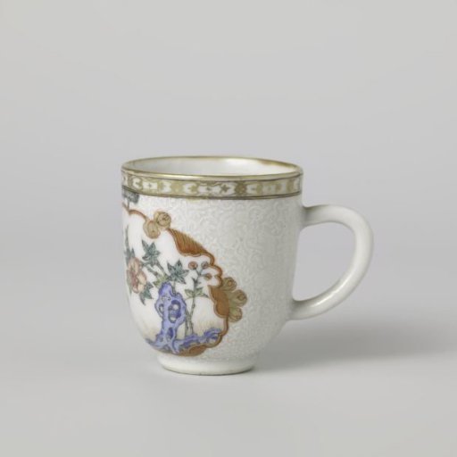 Cup with handle with a crane near a peony plant and rock