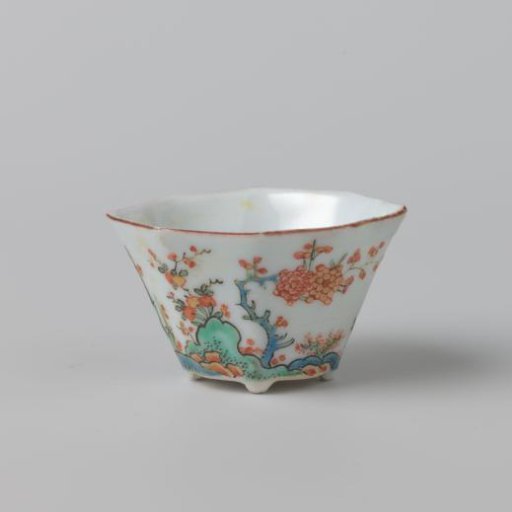 Octagonal cup with flowering plants