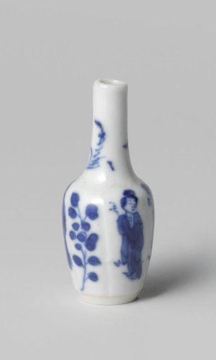 Miniature bottle vase with flowering plants and women