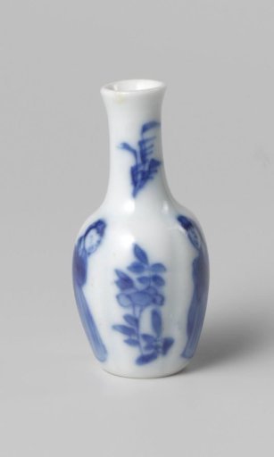 Miniature bottle vase with flowering plants and women