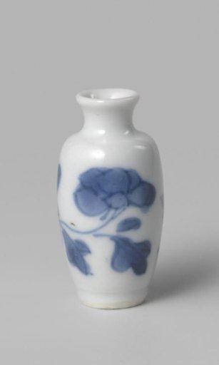 Miniature vase with a flower spray
