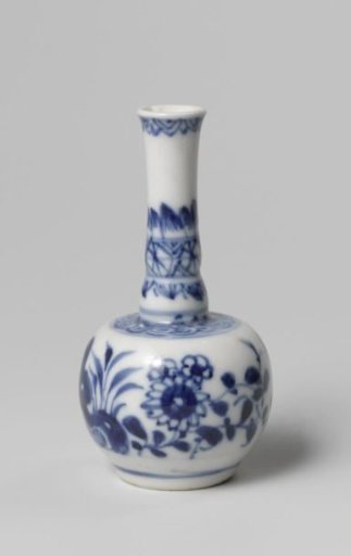 Miniature bottle vase with flowering plants and ornamental borders