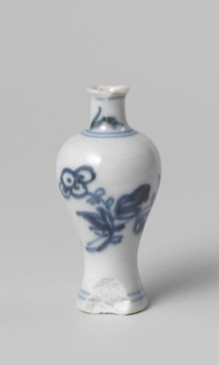Miniature bottle vase with flower sprays