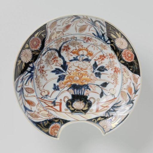 Shaving bowl with a flower vase, quails and flower sprays