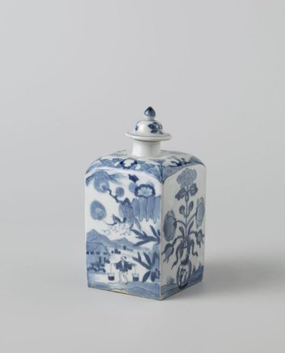 Square bottle with figures in a landscape, a flower vase and a flowering plant near a rock