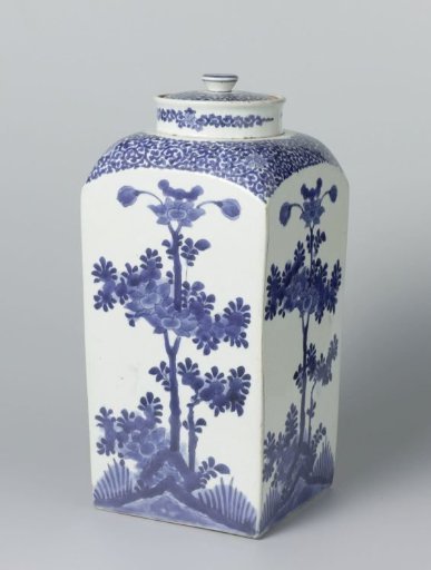 Square bottle with scrolls and flowering trees near rocks