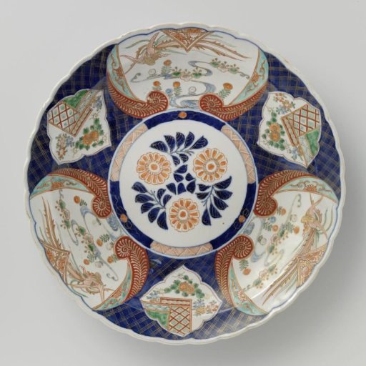 Dish with hoo-birds and flowering plants in panels on diaper pattern