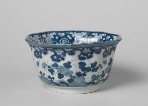 Octagonal bowl with flowering plants in panels