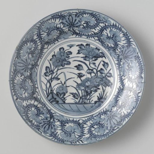 Dish with chrysanthemums and peonies behind a fence and lotus scrolls