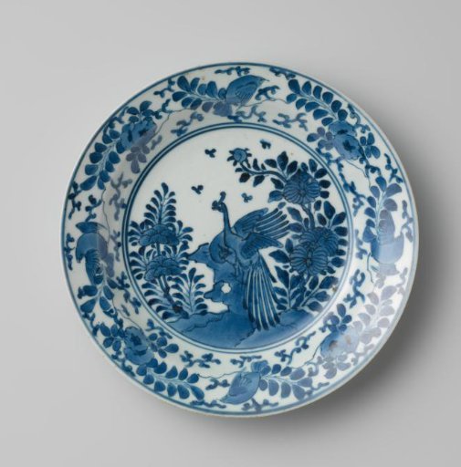 Plate with two hoo-birds on a rock and floral scrolls