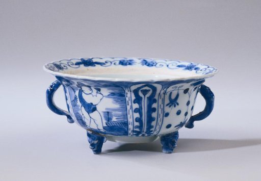 Covered bowl or butter tub with a figure in a landscape, lotus scrolls and flower sprays