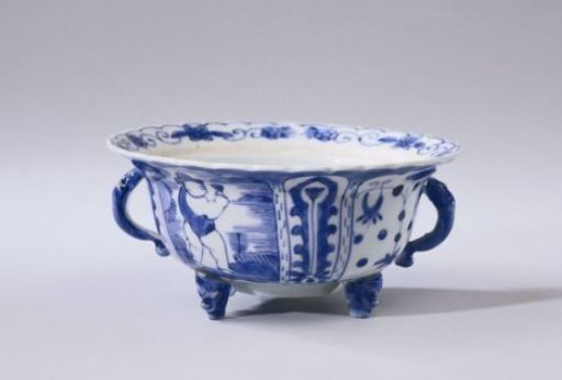 Covered bowl or butter tub with a figure in a landscape, lotus scrolls and flower sprays
