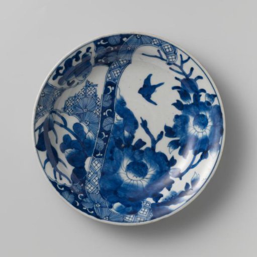 Saucer-dish with a flower spray, bird and scalloped panels with fruit sprays en diaper pattern