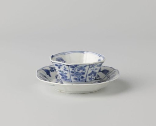 Octagonal cup and saucer with panel decoration with flower sprays