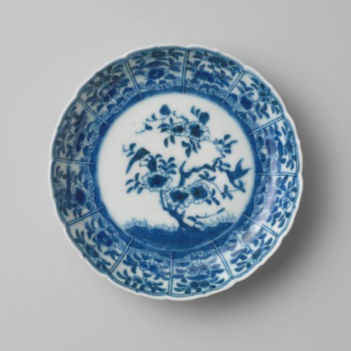 Saucer with flowering plants and two birds