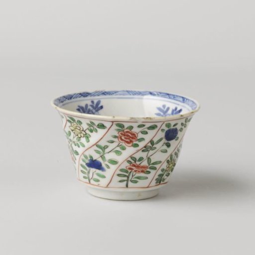Cup with flower sprays in twisted panels