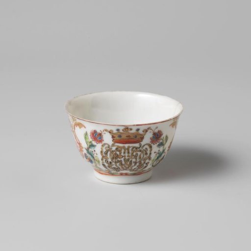 Bell-shaped cup with a crowned, illegible monogram surrounded by two flower sprays