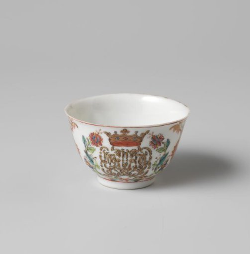 Bell-shaped cup with a crowned, illegible monogram surrounded by two flower sprays