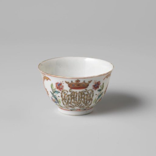 Bell-shaped cup with a crowned, illegible monogram surrounded by two flower sprays