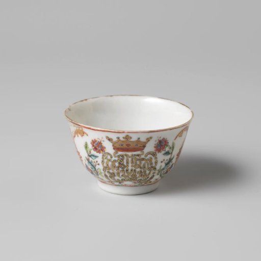 Bell-shaped cup with a crowned, illegible monogram surrounded by two flower sprays