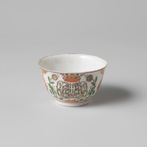 Bell-shaped cup with a crowned, illegible monogram surrounded by two flower sprays