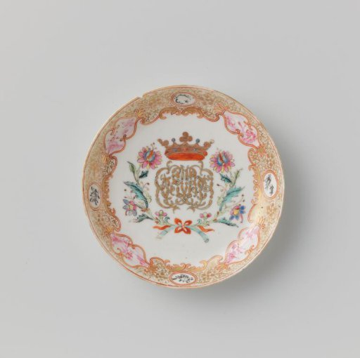 Saucer with a crowned, illegible monogram surrounded by two flower sprays