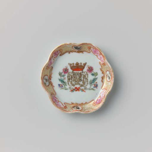 Teapot stand with a crowned, illegible monogram surrounded by two flower sprays
