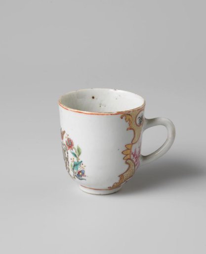 Cup with handle with a crowned, illegible monogram surrounded by two flower sprays